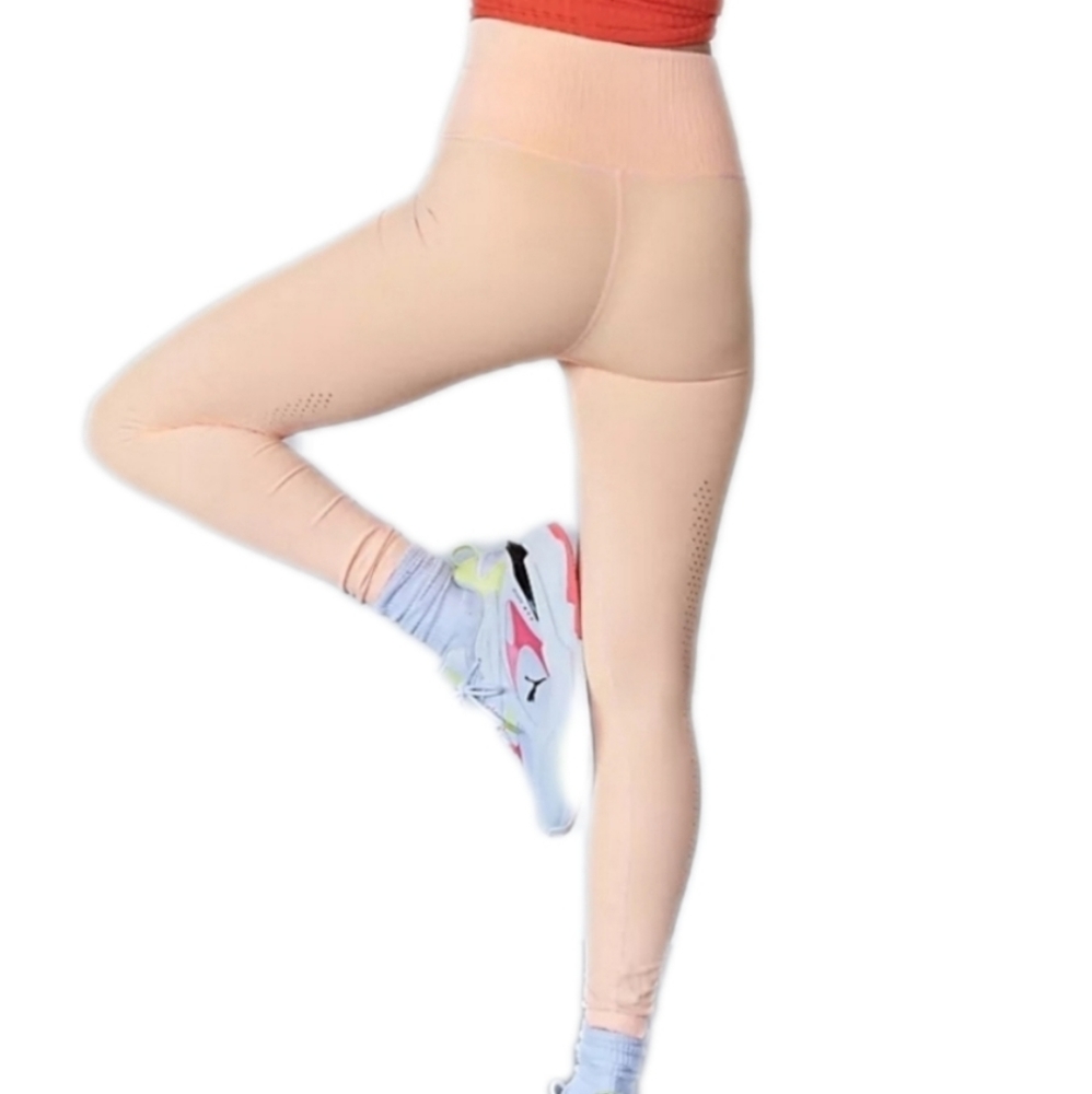 FP Movement Good Karma Bright Neon Orange Leggings in Morning Sun Medium